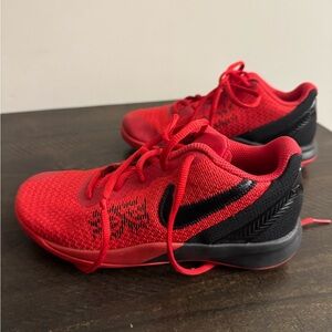 Red and black youth Nike Kyrie Fly Trap 2 gym shoes